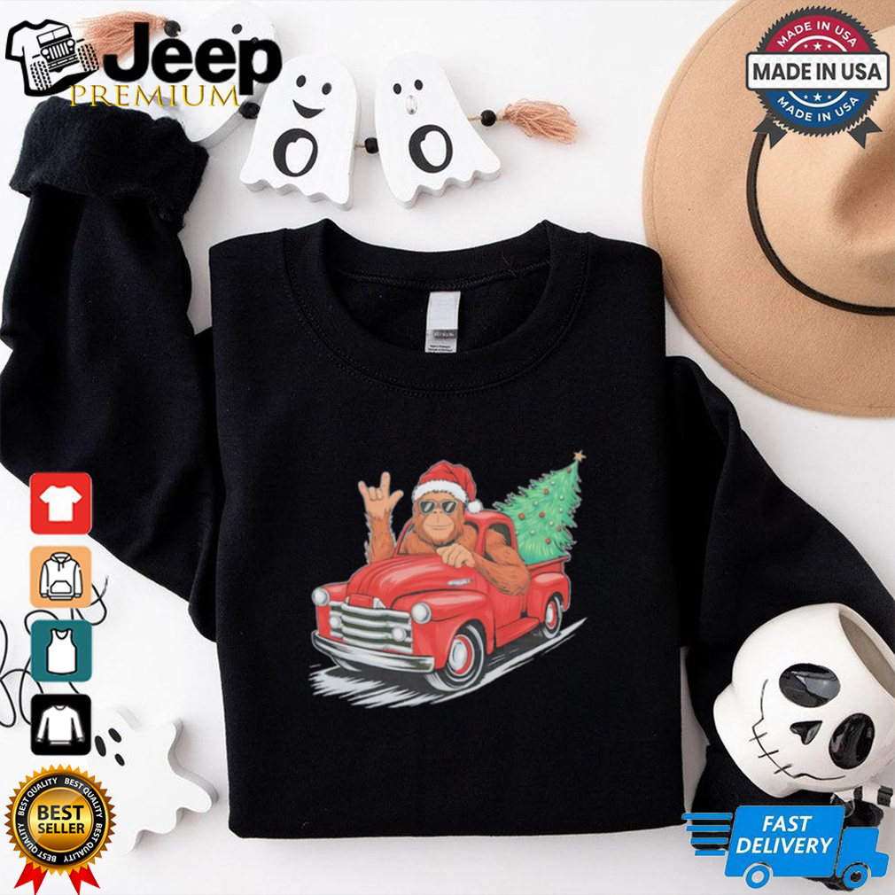Bigfoot Rock On Christmas Tree Light Driving Truck Women’s Shirt Bigfoot Rock On Christmas Tree Light Driving Truck Women’s Shirt
