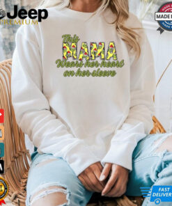 This mama wears her heart on her sleeve Grinch Christmas shirt